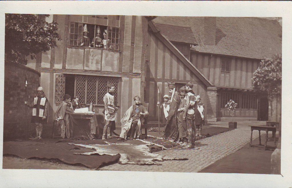 Herbert Jennings, standing centre by the table, as the Earl of Salisbury in Henry V, 1913